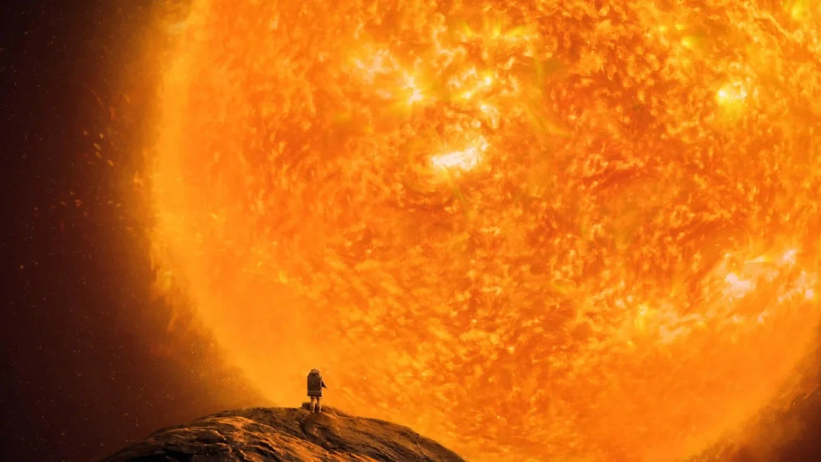 Small astronaut standing on a dark rocky ridge looking at a massive boiling orange sun 4K sci-fi space wallpaper