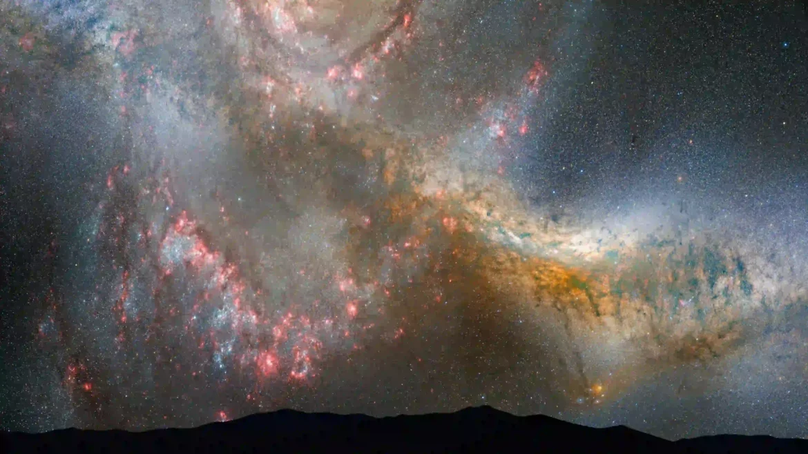 Spiral galaxy wallpaper featuring colorful nebulae, billions of stars, and deep space cosmic clouds in stunning 4K Ultra HD