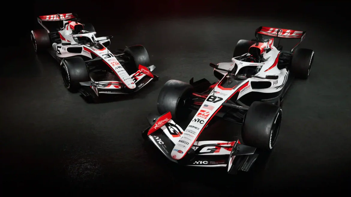 Haas VF-26 Formula 1 race cars in white and red livery 4K wallpaper