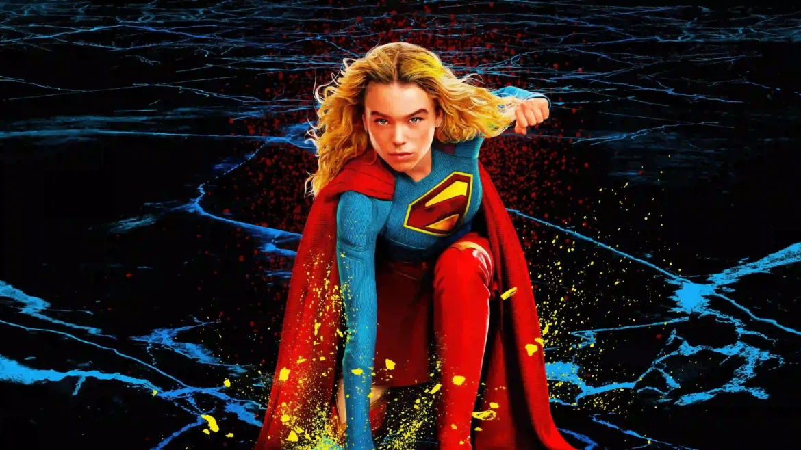 Superhero artwork of Milly Alcock as Supergirl Kara Zor-El crouching in a landing pose with yellow energy particles and a dark background in a 4K wallpaper